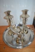Three White Metal Candlesticks