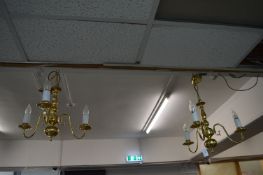 Pair of Brass Faux Candle Chandeliers