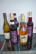 Six Bottles of Assorted Alcohols Including Brandy and Mulled Wine