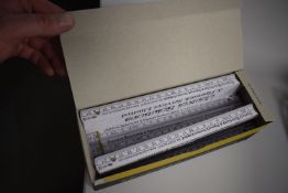 *Box of Folding Rules