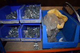 *Contents of Shelf to Include Clamp Clips, Pipe Clamps, and Springs