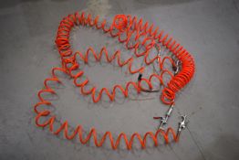 *Three Coiled Air Hoses with Guns