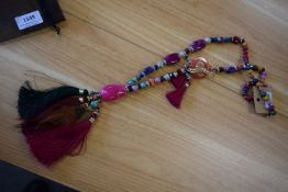 *Long Beaded Necklace in Purples