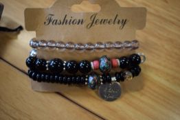 *Three Bracelets in Black