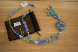 *Long Beaded Necklace in Blue