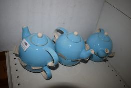 *Three Turquoise Tea for One Teapots with Cups