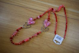 *Long Beaded Necklace in Orange