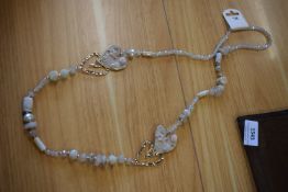 *Long Beaded Necklace in Cream
