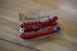 *Three Bracelets in Red