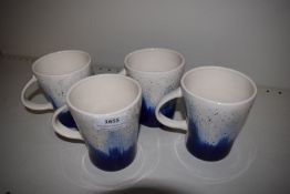 *Set of Four Blue & White Mugs