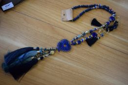 *Long Beaded Necklace in Dark Blue