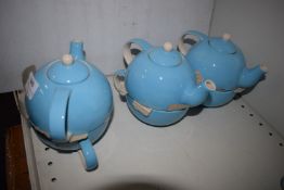 *Three Turquoise Tea for One Teapots with Cups