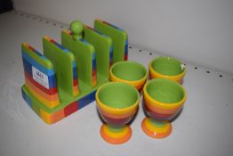 *Rainbow Toast Rack and Four Egg Cups (one chipped)