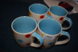 *Four Blue Mugs