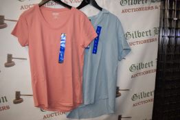 *Hilary Radley Blue Blouse Size: L, and a Kirkland Apricot T-Shirt Size: L