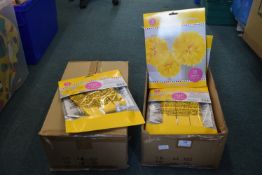 *Two Boxes of Yellow Decorations