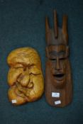 Two Carved Wooden Tribal Masks