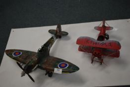 Metal Spitfire and a Biplane
