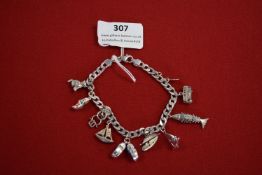 Sterling Silver Charm Bracelet with Sterling and Continental Charms