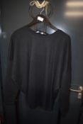 *Jezebel Women’s Black Long Sleeve Top Size: XL