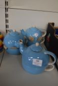 *Three Blue Single Teapots