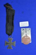 1914 German Iron Cross 2nd Class, German WWII POW Stalag VIII Dog Tag ID No. 81507, and British WWII