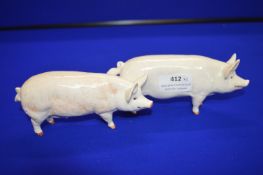 Pair of Beswick Champion Pigs “Wall Boy” and “Wall Queen”