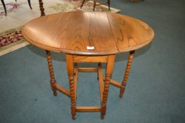 1930’s Oak Barley Twist Oval Drop Leaf Table