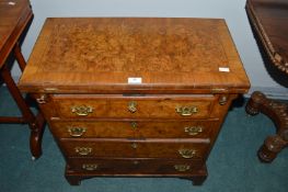 Georgian Mahogany Four Drawer Chest with Fold Over Top and Burr Walnut Inlaid Panels