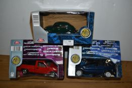 Three Motormax Die Cast classic cars