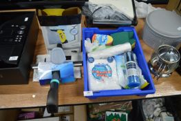 Assorted Cleaning Products Including Cloths, Window Cleaner, etc.