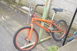 Child’s Orange Bicycle