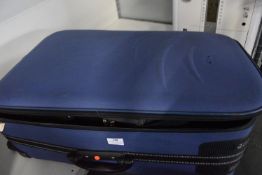 Suitcase Containing Handbags and Shoes