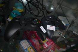 Xbox Controller and a Power-A Xbox Controller