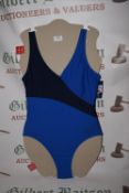 *Reebok Women’s Blue Swimsuit Size: 12