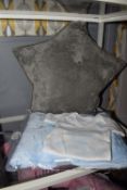 *Baby Vest, Blue Bay Blanket, and a Grey Star Cushion