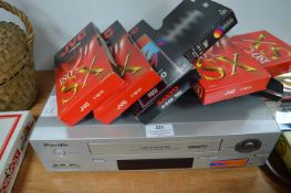 Vintage VHS Player and Tapes