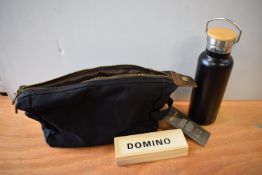 *Black Wax Canvas Toiletry Bag, Dominoes Travel Set, and a Black Thermos Flask