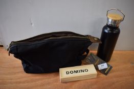 *Black Wax Canvas Toiletry Bag, Dominoes Travel Set, and a Black Thermos Flask