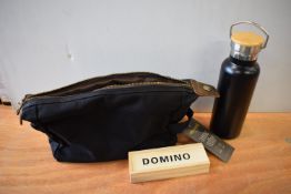 *Black Wax Canvas Toiletry Bag, Dominoes Travel Set, and a Black Thermos Flask
