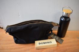 *Black Wax Canvas Toiletry Bag, Dominoes Travel Set, and a Black Thermos Flask