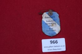 An unusual paper and card badge issued as a Dauerkarte (season ticket) for the 1927 Volksfest in