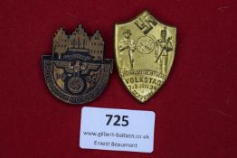 Two German Third Reich Day Badges: one gilt shield-shaped example for the NSDAP 