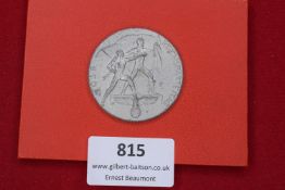 Reichsparteitag badge, 1936, circular zinc type depicting two figures with flag above eagle and