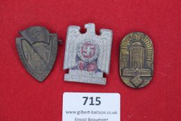 A group of three Third Reich tinnies: NSDAP Gautag Stuttgart 1933 shield-shaped badge with