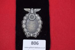 SA Treffen Braunschweig Badge, 17/18 October 1931, oval wreath design with eagle and swastika above,