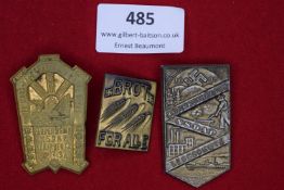 Three badges: a gilt-finish tinnie for the Fahnenweihe der NSDAP, Scharbeutz, 22 July 1934; a