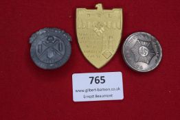 Three German Day Badges, comprising: circular grey badge 6. Artillerie Regiment Appell,