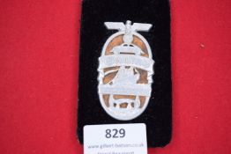 A 1939 Gautag Hannover Day Badge, large aluminium example with eagle and swastika above images of
