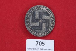 A circular grey metal day badge inscribed “Kreis-Parteitag N.S.D.A.P. Arnsfeld-Herdecke 4.9.11.